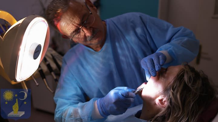 dentist placing a dental implant